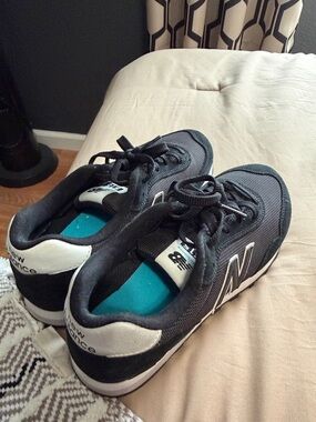 New Balance Black and White Low-Top Sneakers